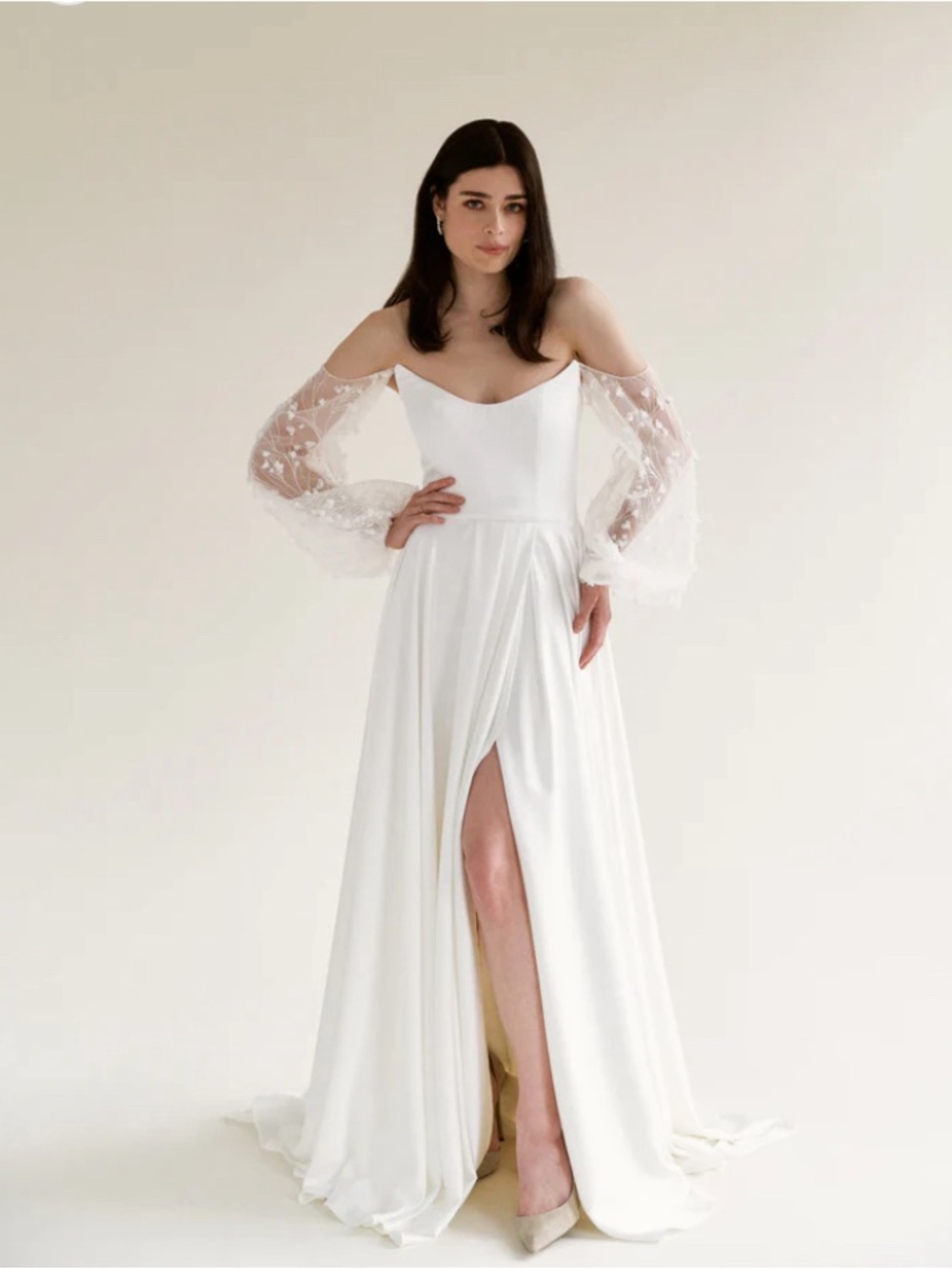 Pandora by Truvelle 

Off-Shoulder White Bridal Gown with Sheer sleeves